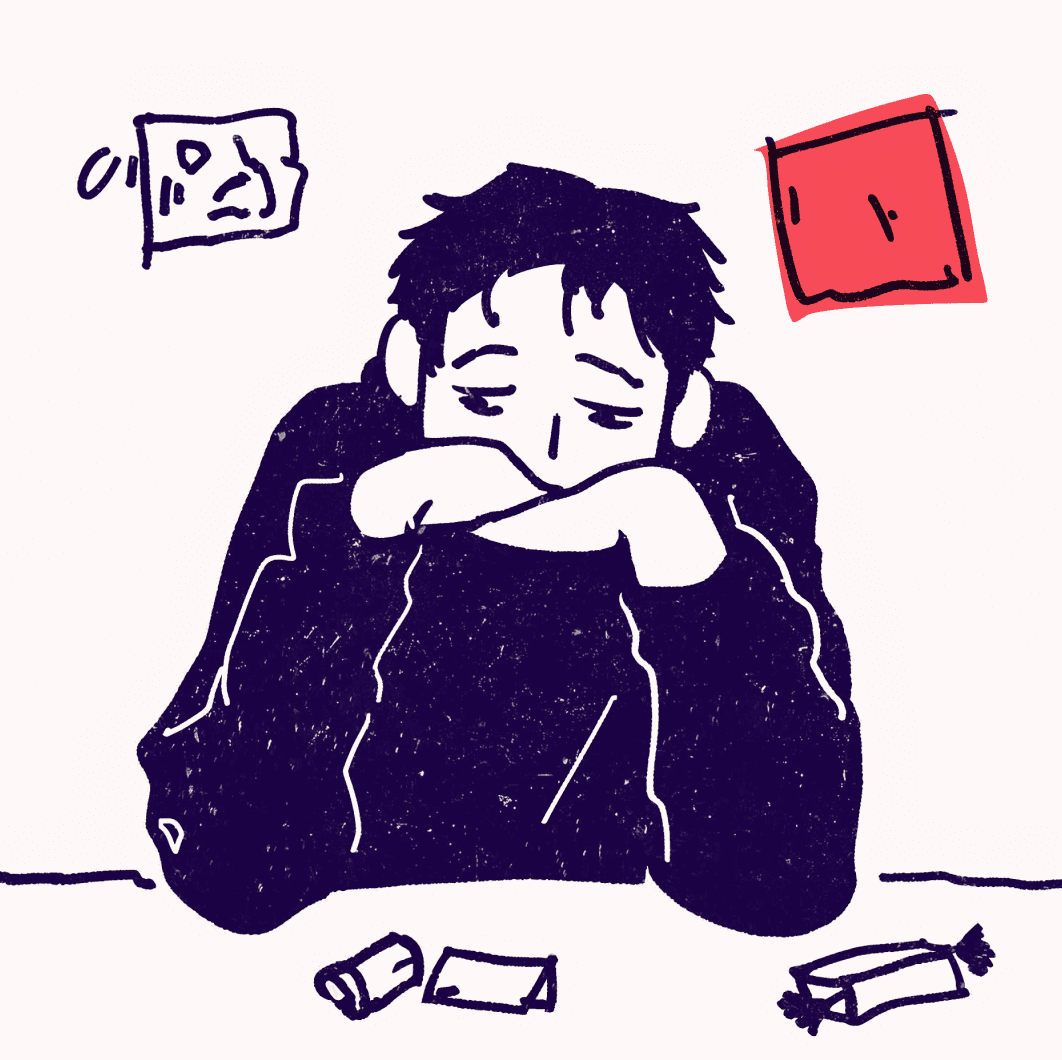 Illustrasjon av en person med kort hår som hviler hodet på kryssede armer ved et bord. To uåpnede godterier og et par veggdekorasjoner er synlige.